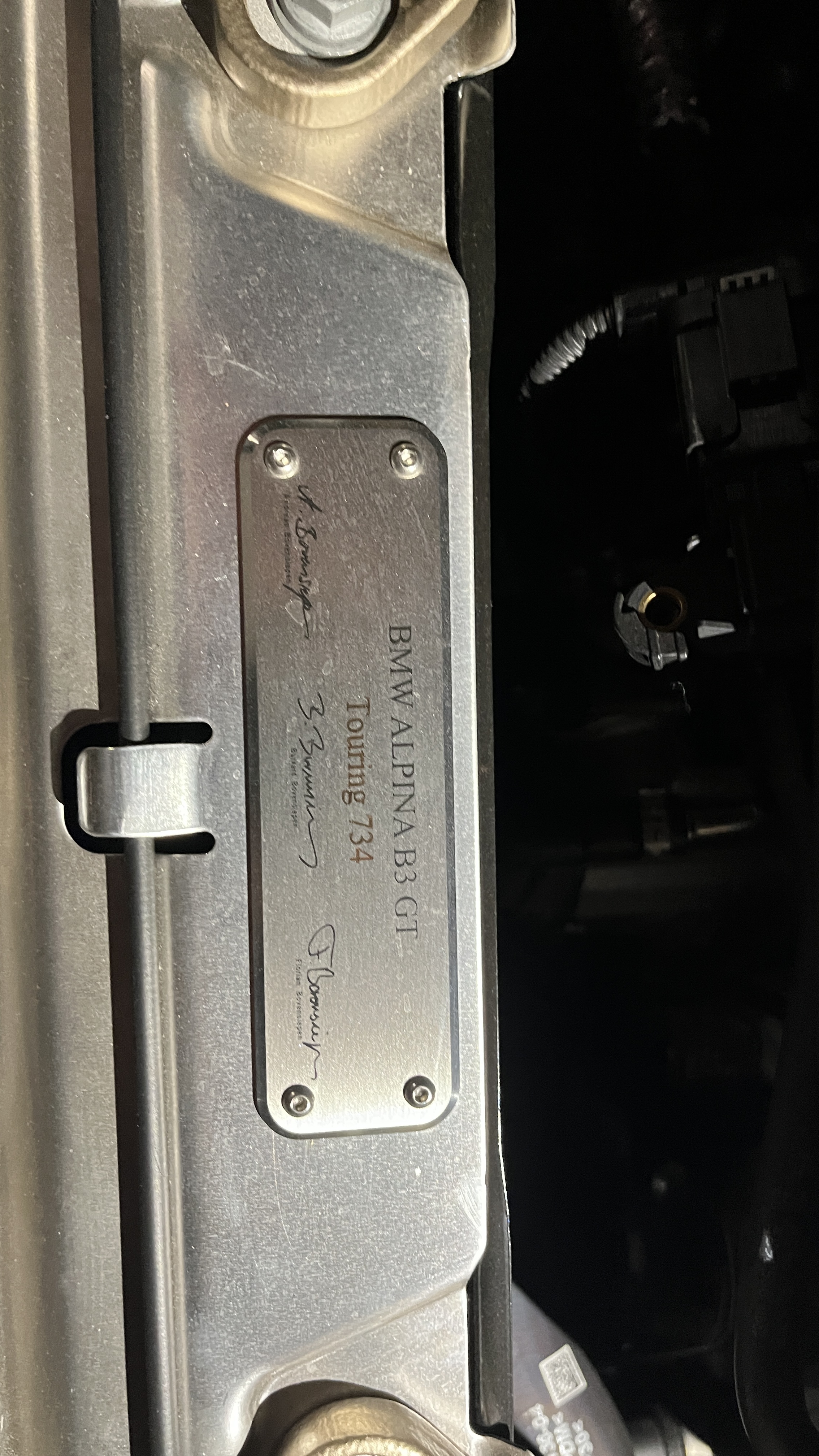 ALPINA production number plaque on the car.