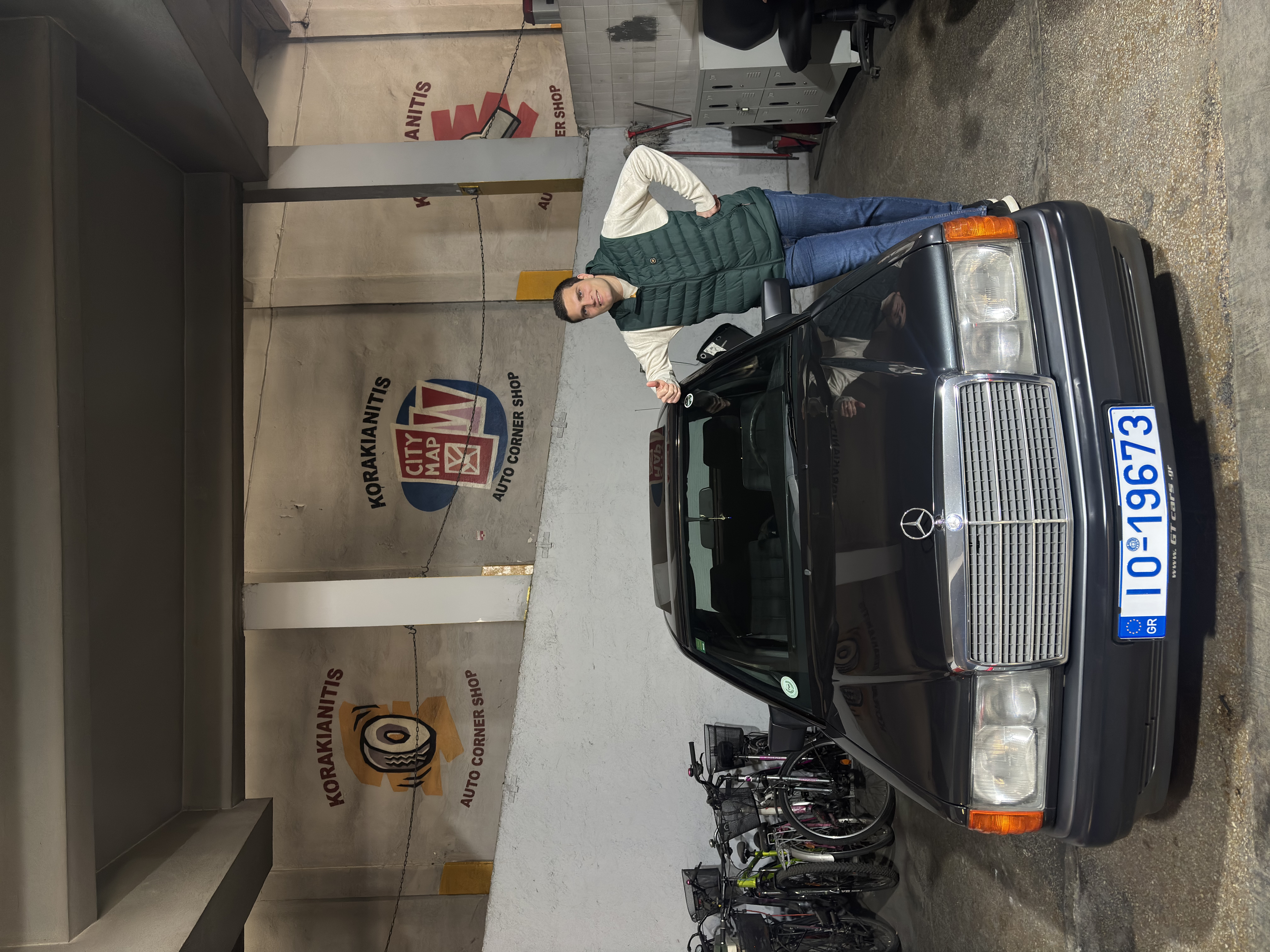 Georgios Koufopoulos with his 1989 Mercedes-Benz 190E at the Korakianitis Auto Corner Shop