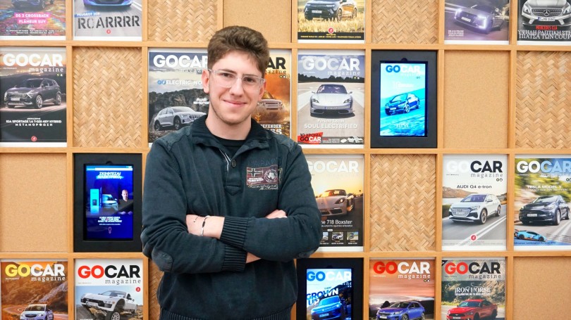 Nikolaos Korakianitis, founder of KAR Auto Research, at the GOCAR magazine wall